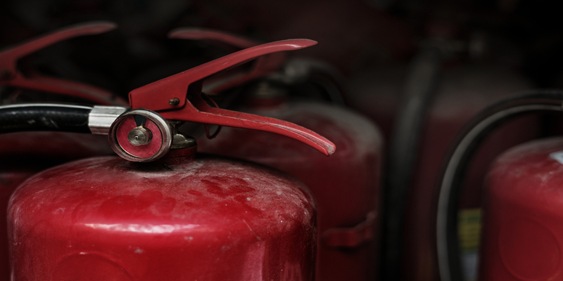 closeup-red-fire-extinguishers (2)