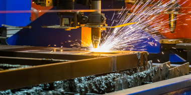 closeup-shot-sparks-flying-from-industrial-steel-cutter (1)